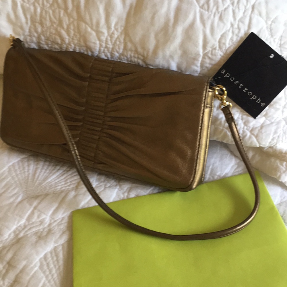 Purse. Handbag. Clutch. Short strap. New. Apostrophe.Priced to sell🌺
